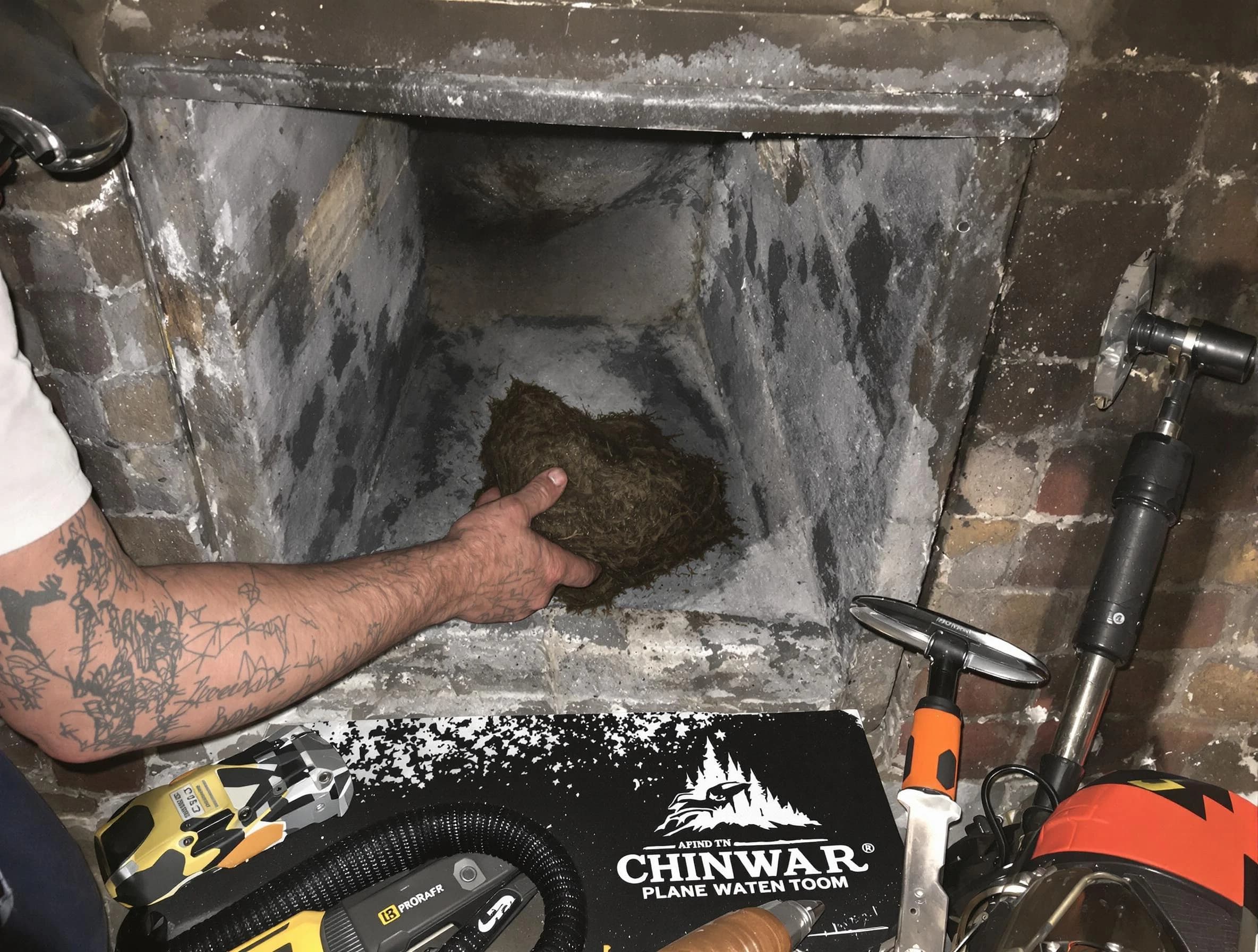Englewood Chimney Sweep safely removing debris and screening chimney in Englewood, NJ