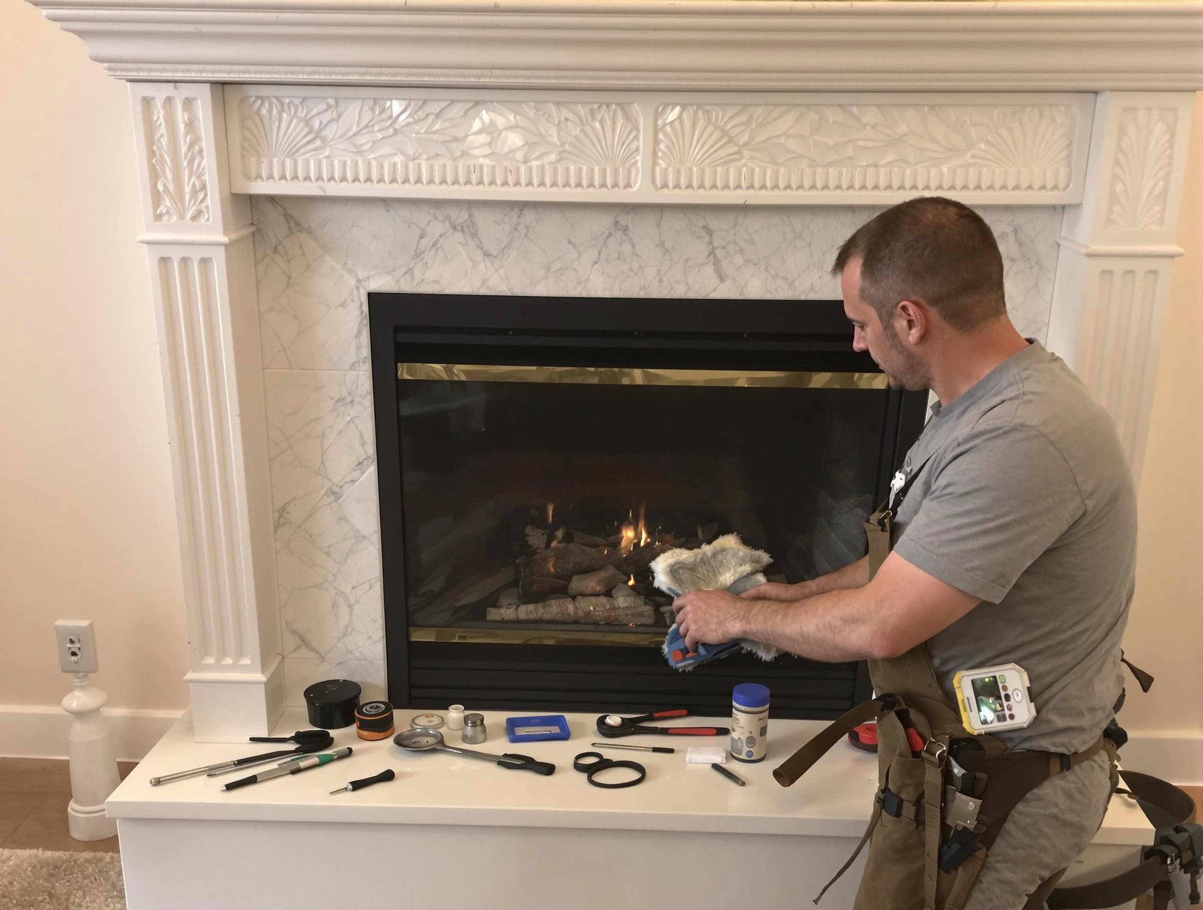 Englewood Chimney Sweep performing fireplace maintenance in Englewood, NJ